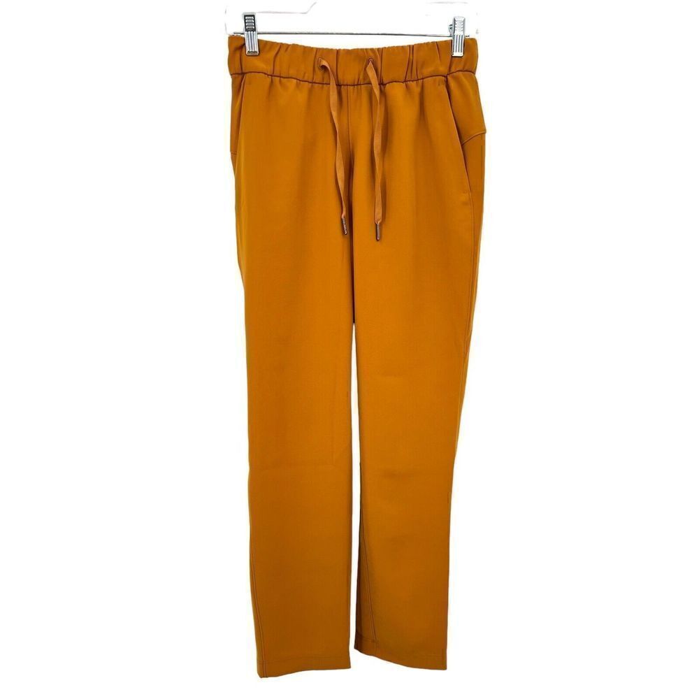 Lululemon On the Fly 7/8 Pant Woven Vintage Gold Mustard Yellow Women’s Size 4